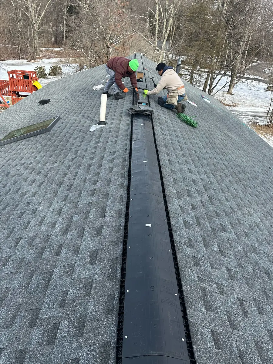 Finished asphalt shingle roof by SSKM Construction