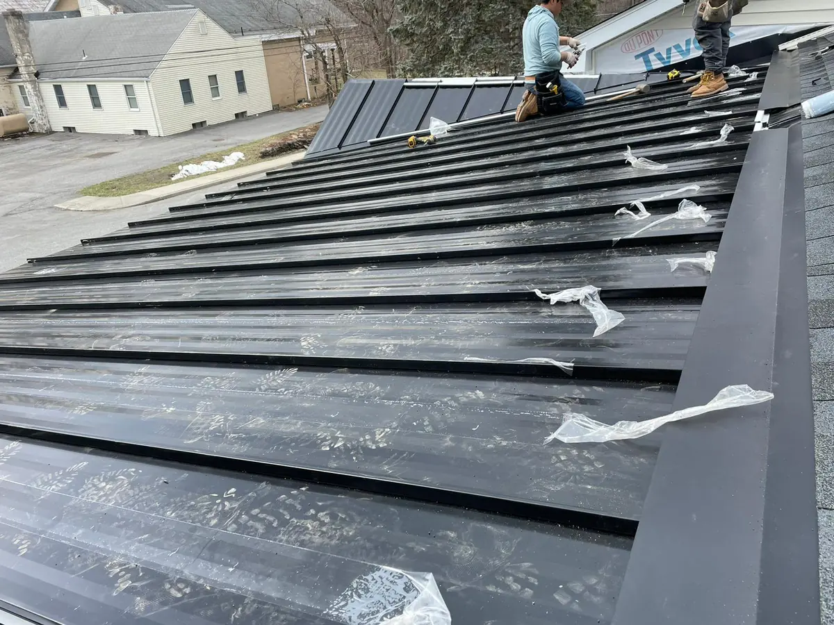 Roof tear-off and replacement by SSKM Construction