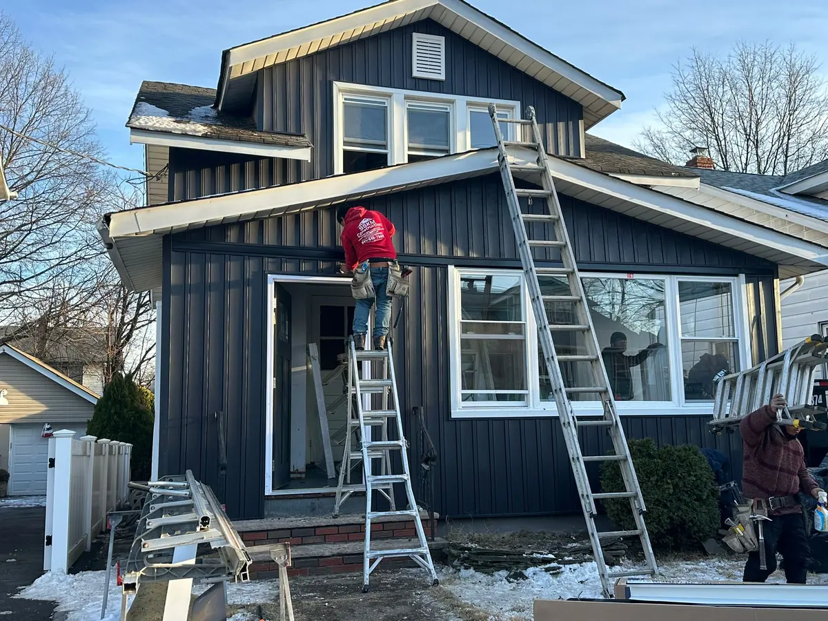 Siding installation in progress on a Hudson Valley home